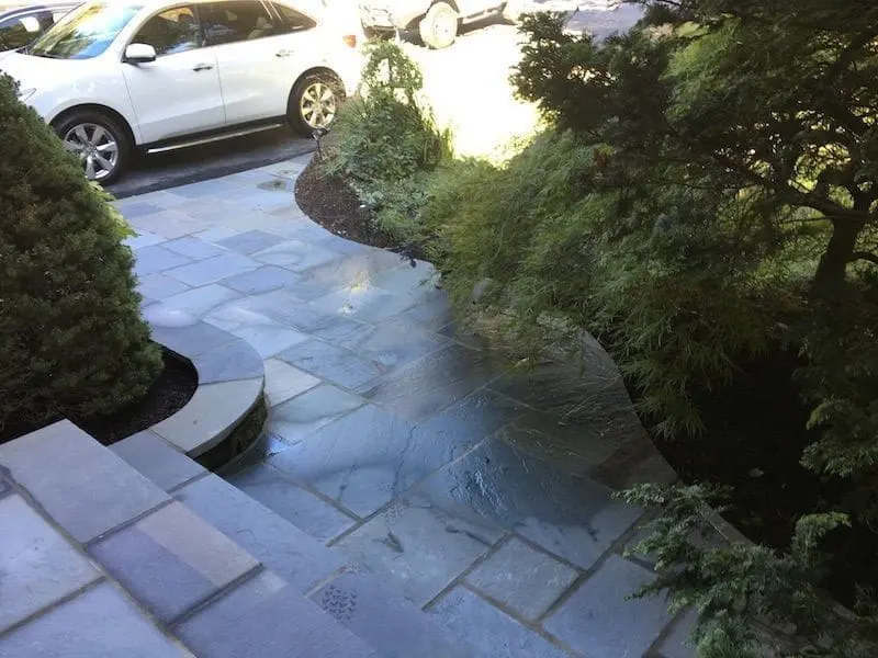 Flagstone walkways, steps, and driveway.